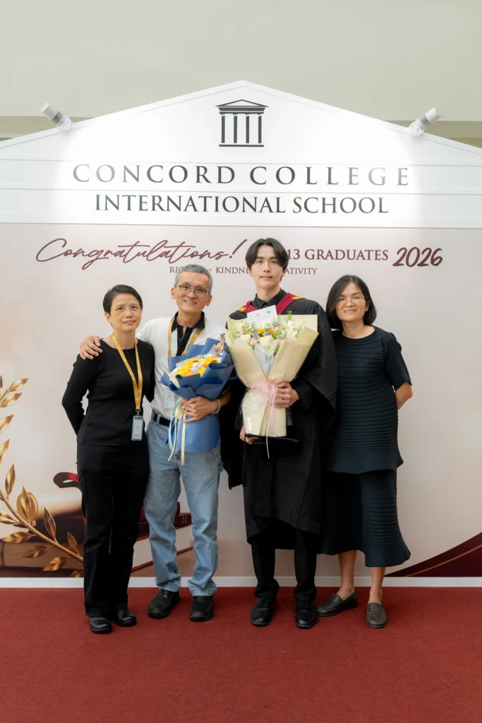 Four individuals posing in front of a backdrop for Concord College International School's Year 13 Graduation 2026.